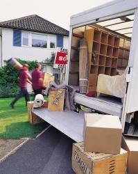 Movers unloading a truck